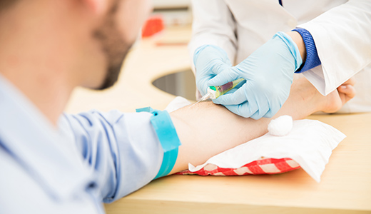 Pov of patient getting a blood test