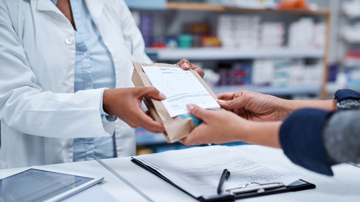 closeup_hands_holding_prescription_1010456164.jpg
